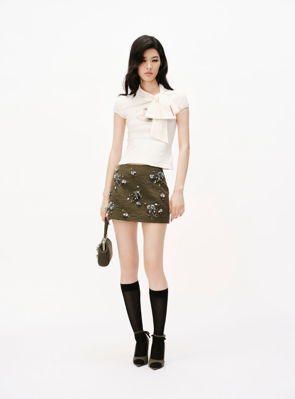 Mark Gong Olive Green Floral Embelished Mini Skirt, styled on model